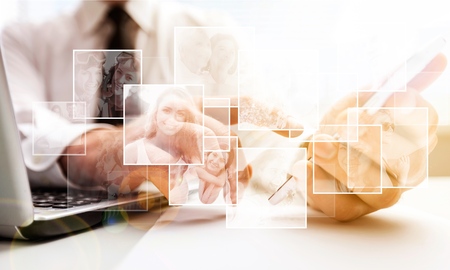 business documents on office table with digital tablet computer with smart phone and graph business digital diagram and businessman working in the backgroundの写真素材