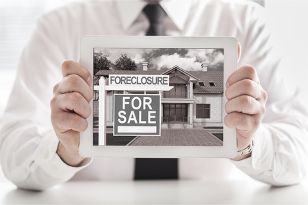businessman hand working with modern technology digital tablet computer and digital layer effect as...