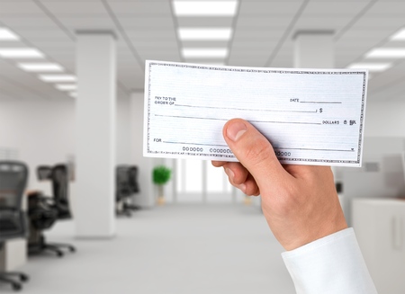 Blank check in hand