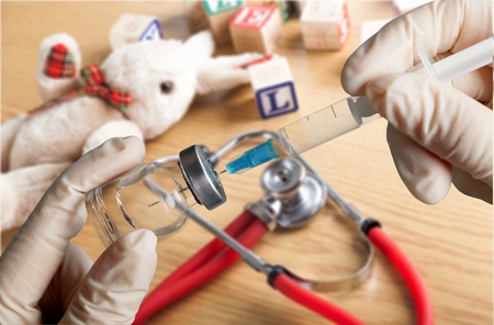 Filled syringe in vial