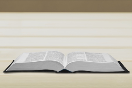 Open Book on wood background