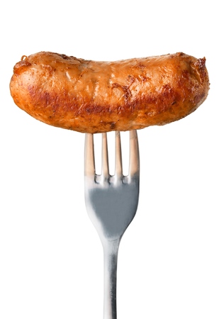 Freshly cooked sausage on a forkの写真素材