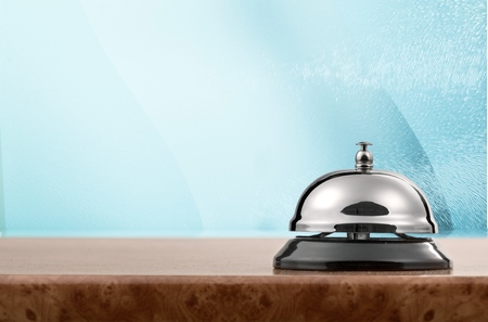 Vintage hotel reception service desk bell.