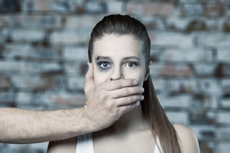 Fear of woman victim of domestic violence and abuse. isolated on white background