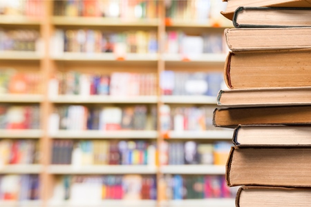 Old Books stacked in library