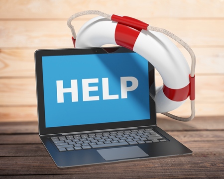 Laptop in lifebuoy - isolated on white with clipping pathの写真素材