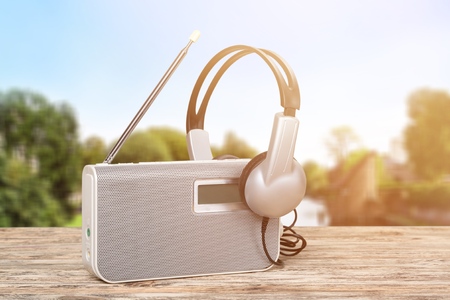 Retro radio cassette stereo on wooden tableの写真素材