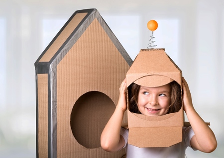 child is dressed in an astronaut costumeの写真素材
