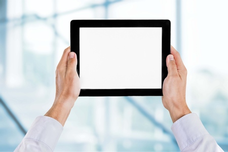 Holding Tablet PCの写真素材