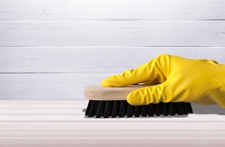 Cleaning yellow hand