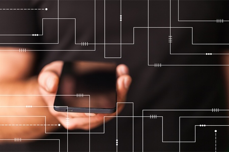 Hand holding phone with illustrationの写真素材