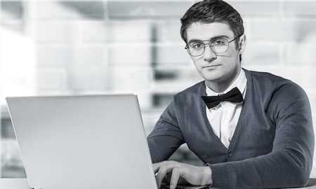 astonished boy working on laptopの写真素材