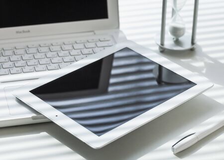KHERSON, UKRAINE - FEBRUARY 19 :electronic devices on office tableのeditorial素材