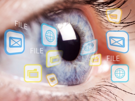 Close-up of womans brown eye. High Technologies in the futureの写真素材