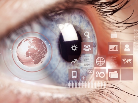 Close-up of womans brown eye. High Technologies in the future