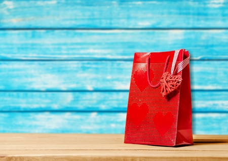 Valentines day background with shopping bag and heart shapeの写真素材