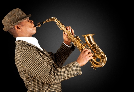 African American jazz musician playing the saxophone, closeupの写真素材