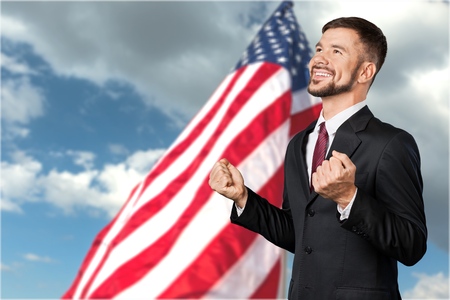 Businessman rejoicing for his successの写真素材