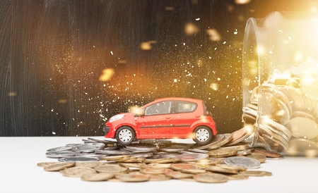 Miniature car model and Financial statementの写真素材