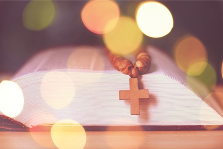 Brown cross on the Bibleの写真素材
