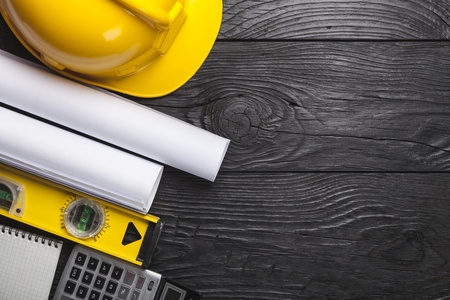 Engineering equipment set on wooden background