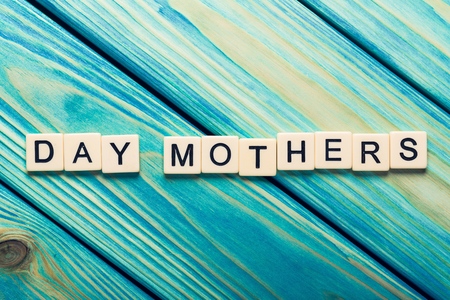 Day mothers text on a wooden backgroundの写真素材
