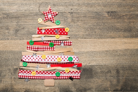 Christmas tree on wooden backgroundの写真素材
