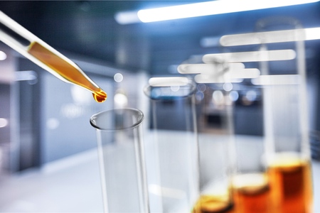 Oil in glass lab tubeの写真素材