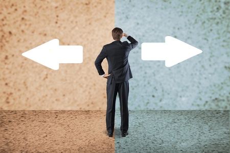 Salesman in doubt standingの写真素材