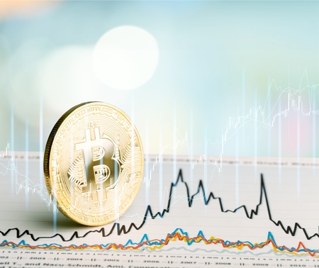 Bitcoin on laptop keyboardの写真素材