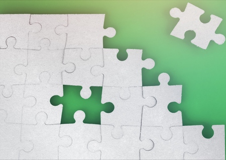White jigsaw puzzle as a human brain on purple background w/ copy space. Creative idea for memory...