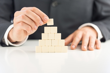 Human resources and social networking concept - recruiter complete team by one person (employee) represented by icon.の写真素材