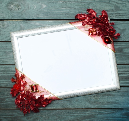 Red bow on menu board with Merry Christmas message on wooden background