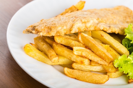 plate of traditional English fish and chips