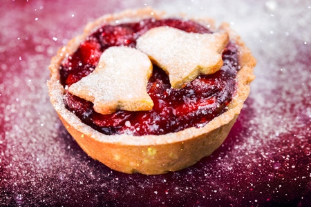 Tartlet with  fresh red  berries on tableの写真素材
