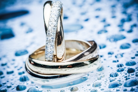 platinum rings on shattered glass (ice blue)の写真素材