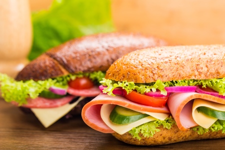 Turkey/chicken breast, ham & swiss and salami sandwichesの写真素材