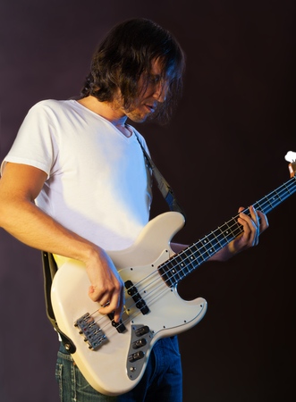 Closeup of a Musician Playing an Electric Bassの写真素材