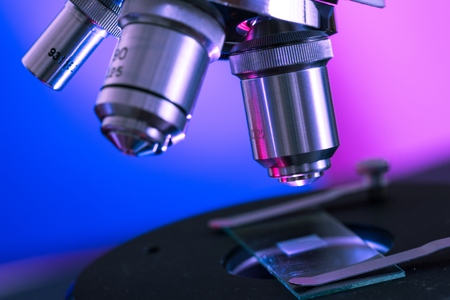 Closeup of Microscope Lenses and Slideの写真素材