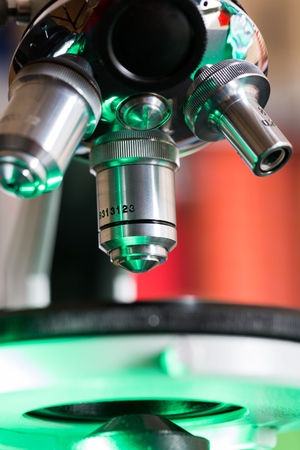 Closeup of Microscope Lenses and Slide