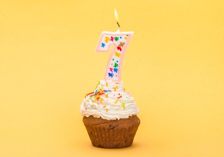 Birthday Cupcake with Number Seven Candleの写真素材