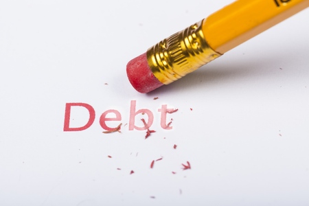 Debt Word is Erased by a Pencil Erase - Close Upの写真素材
