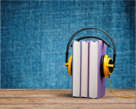 Book with Yellow headphonesの写真素材