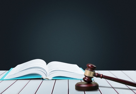 Open law book on tableの写真素材