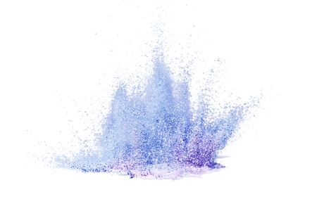 Explosion of colored powder on white backgroundの写真素材