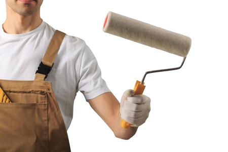 Man holding paint roller isolated on white backgroundの写真素材