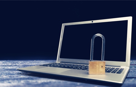 Lock on the laptop  background, Cyber safety concept