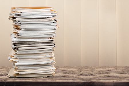 Stack of accumulated paperworkの写真素材