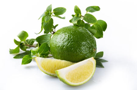 Fresh Limes with Leaves of Mint