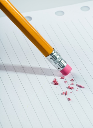 Close-Up of Pencil Eraser on Lined Paperの写真素材